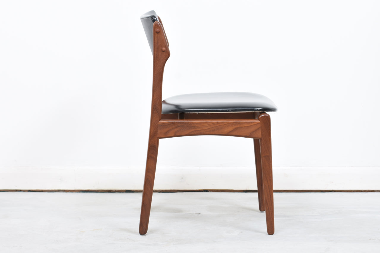 Six available: Teak + skai dining chairs