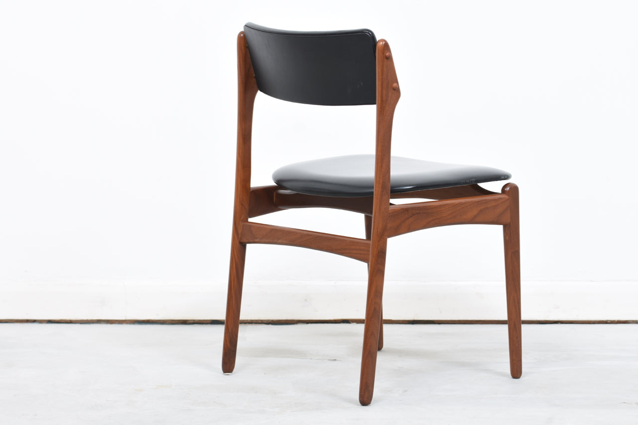 Six available: Teak + skai dining chairs