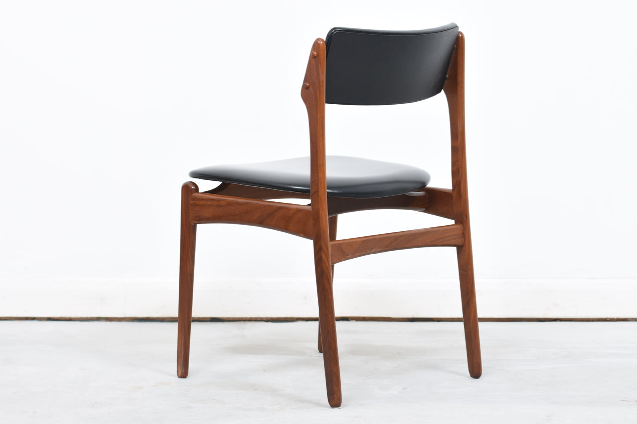 Six available: Teak + skai dining chairs