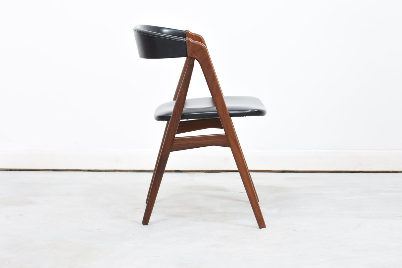 Teak + vinyl dining chair