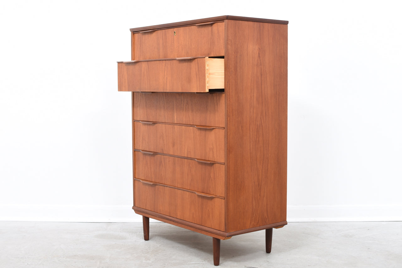 Tall teak chest of drawers