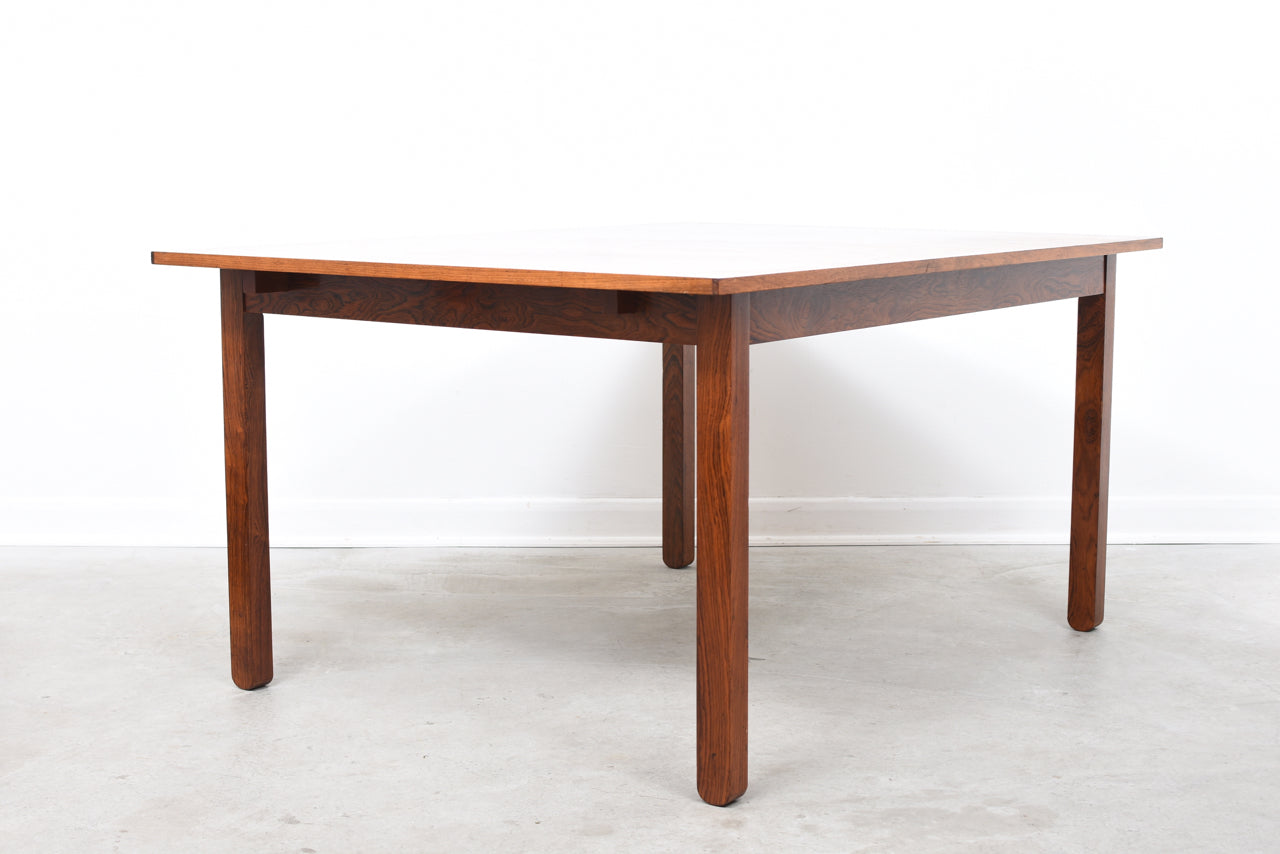 Extending rosewood dining table by Erik Buch