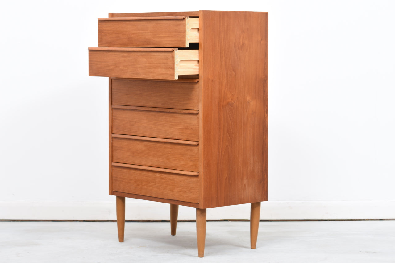 Teak chest of drawers with lipped handles