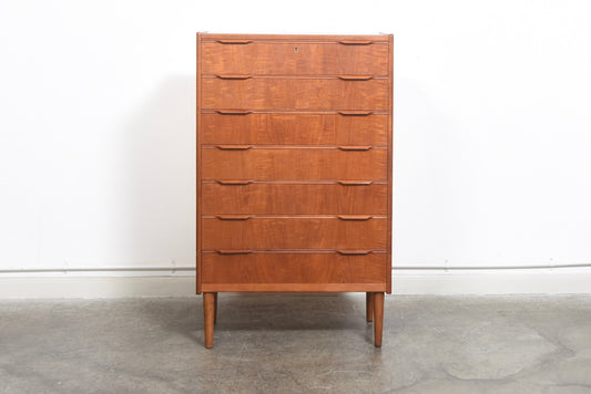 Teak chest of seven drawers