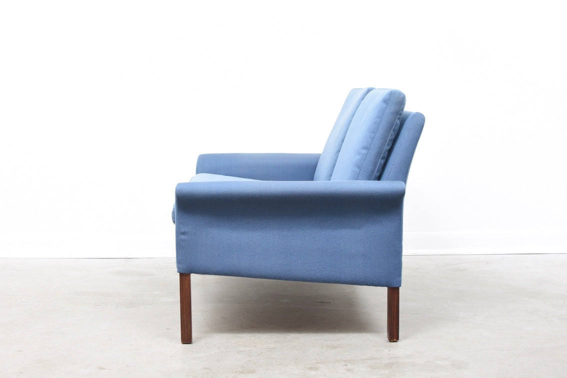 Baby blue two seater on rosewood legs