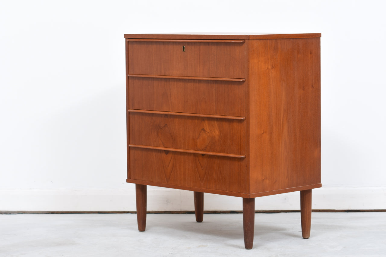 Low chest of four drawers in teak