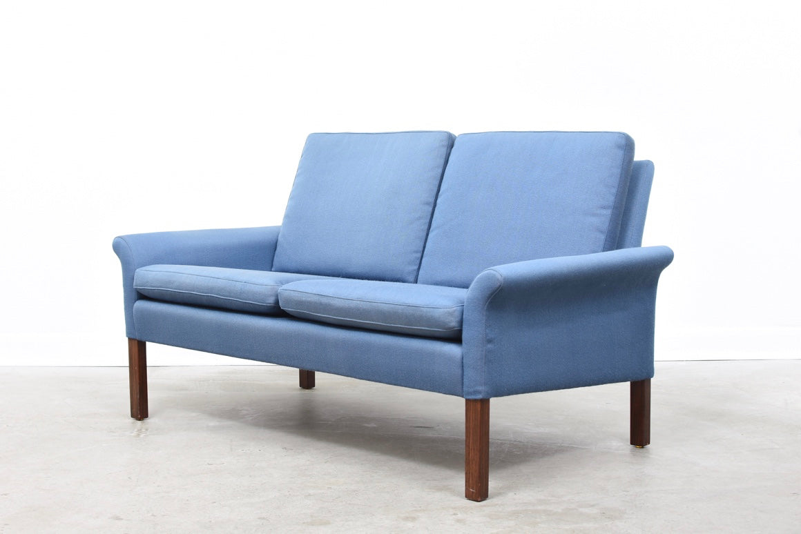 Baby blue two seater on rosewood legs