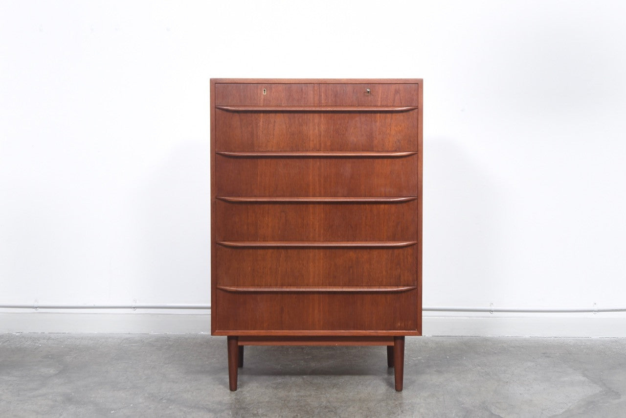 Teak chest of drawers with lipped handles