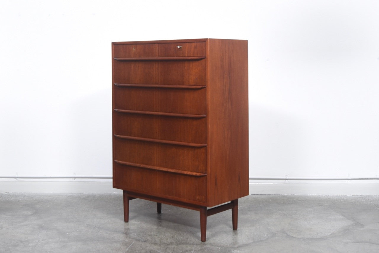 Teak chest of drawers with lipped handles