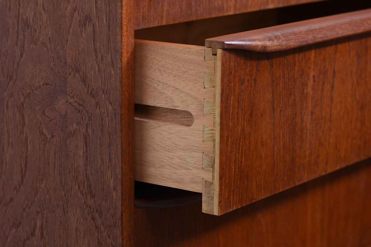 Teak chest of drawers with lipped handles