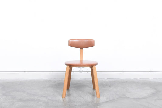Leather + oak chair by Karl Andersson