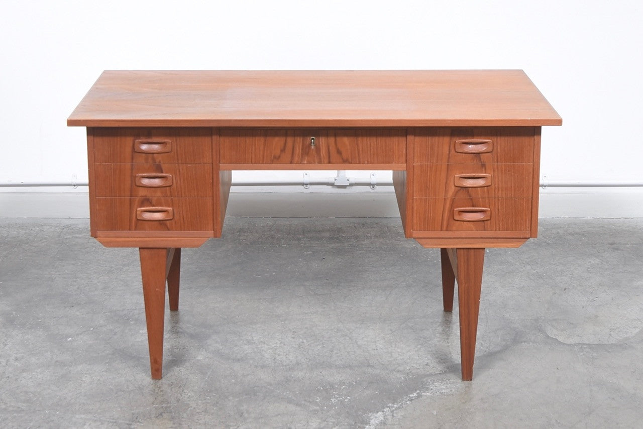 Twin pedestal desk in teak