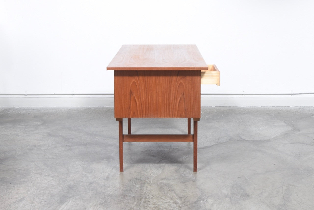 Twin pedestal desk in teak