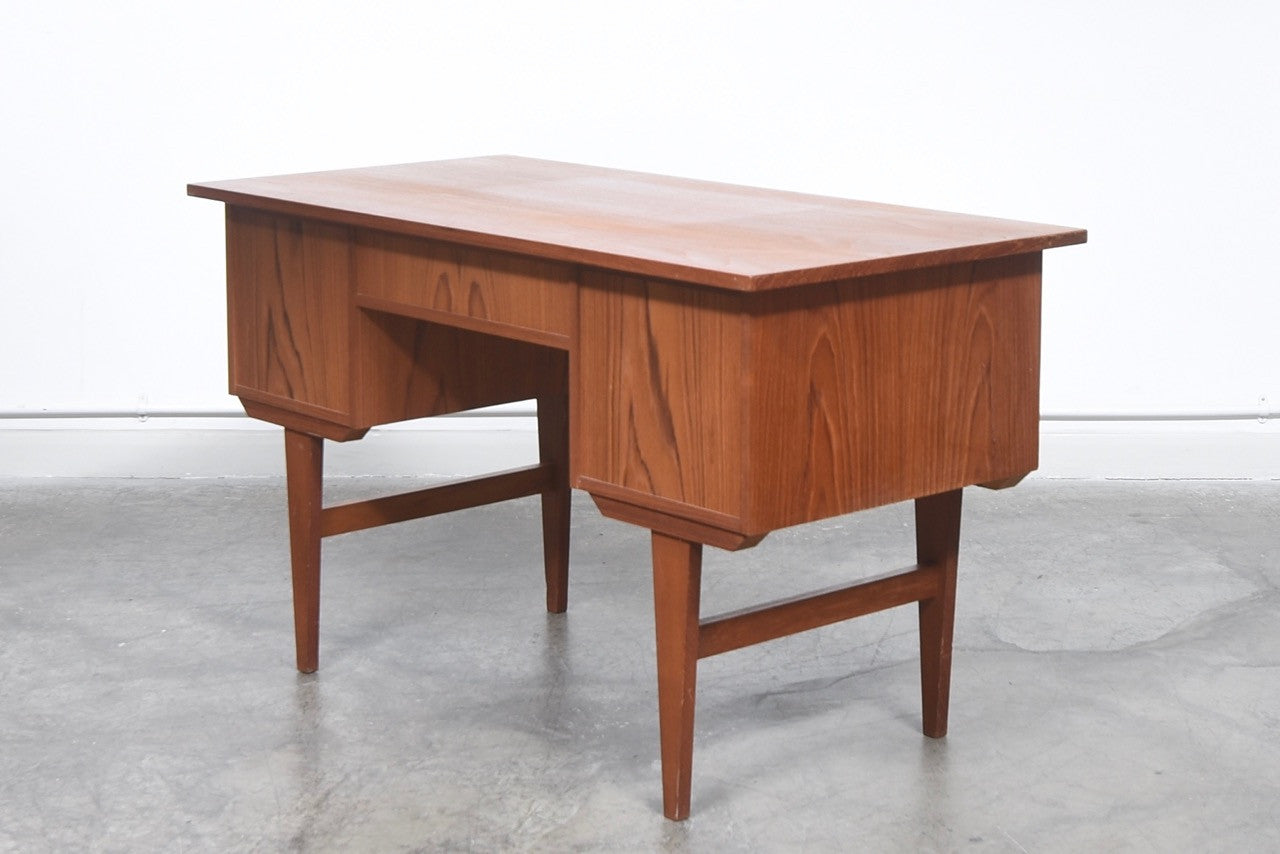 Twin pedestal desk in teak