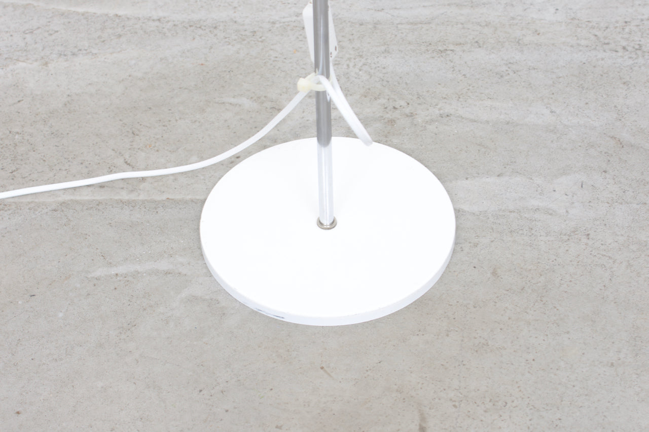 Twin-headed floor lamp with white shades