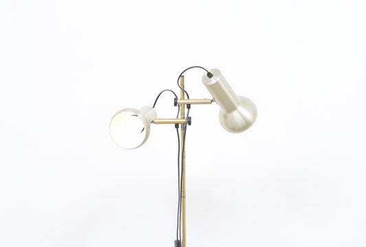 Twin-headed floor lamp with pale brass shades