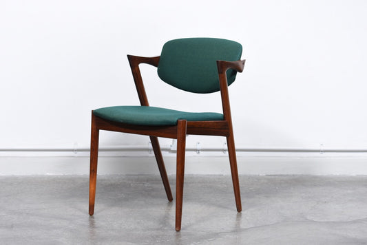 Set of four 'Model 42' chairs in rosewood by Kai Kristiansen