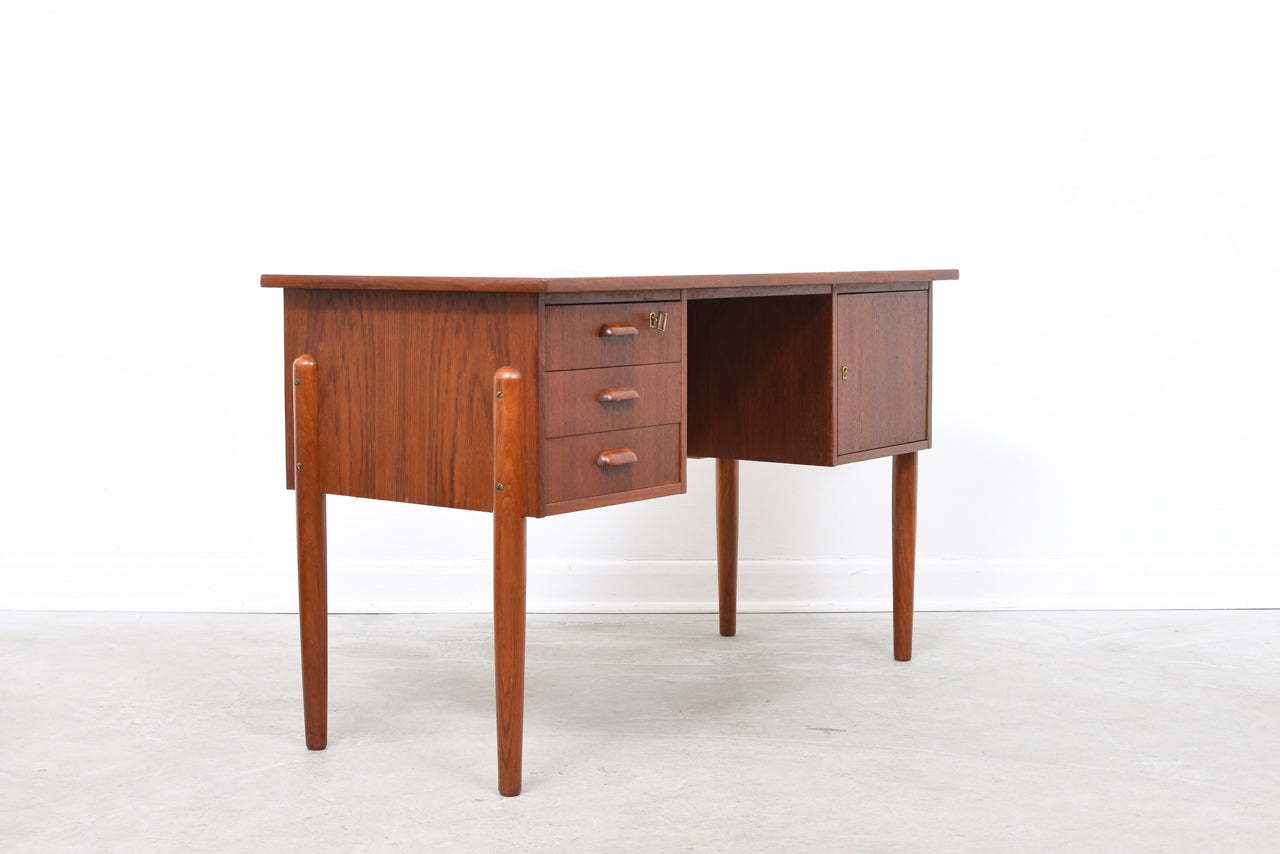 Twin pedestal desk in teak