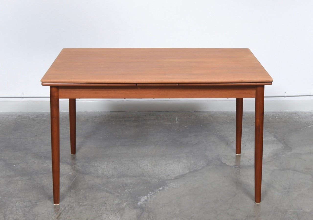 Extending dining table in teak no. 1