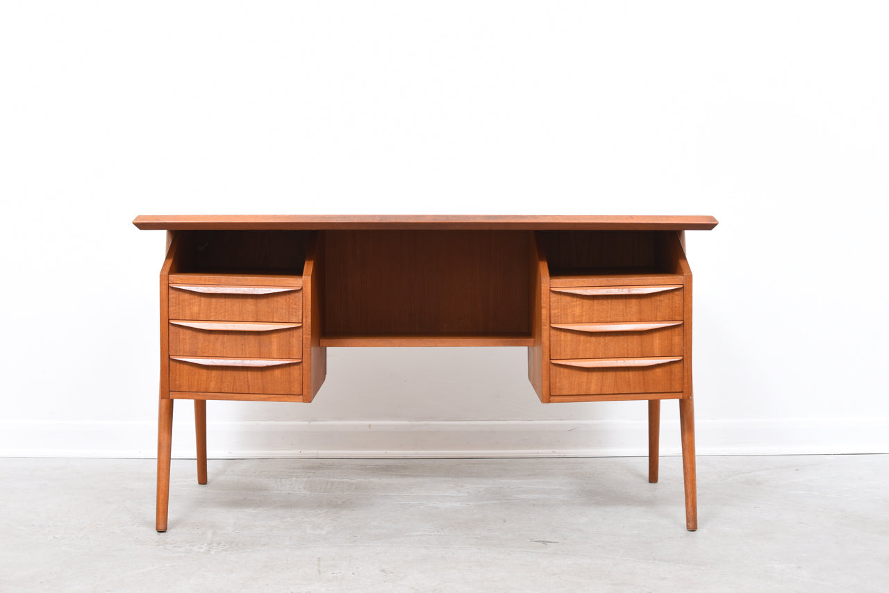 1960s Danish teak desk on splayed legs