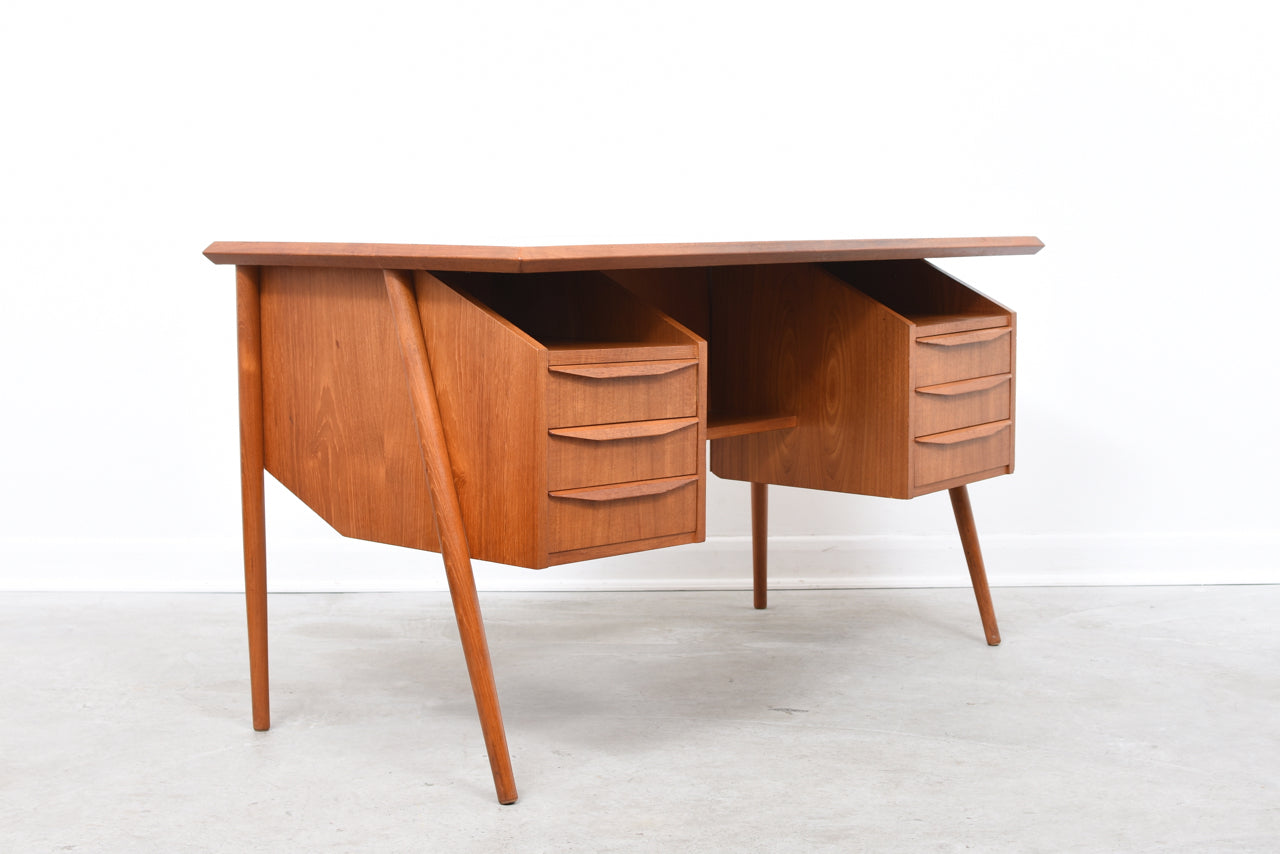 1960s Danish teak desk on splayed legs