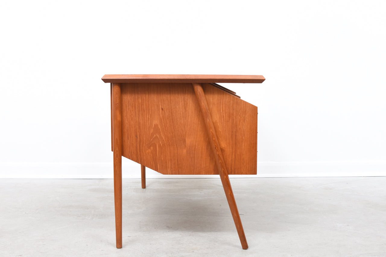 1960s Danish teak desk on splayed legs