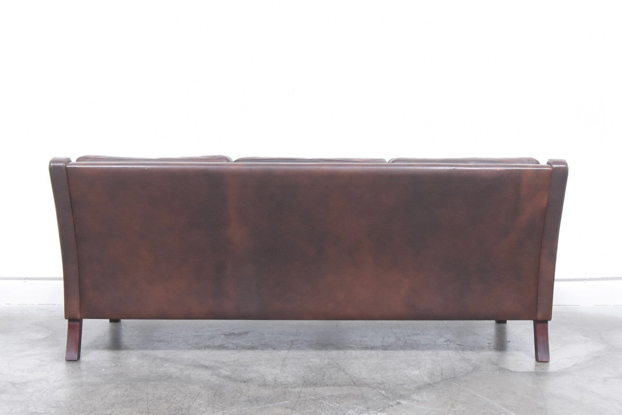 Three seat leather sofa by Vemb