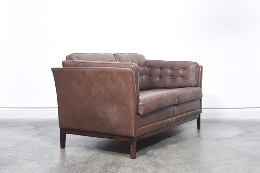 Danish two seat leather sofa