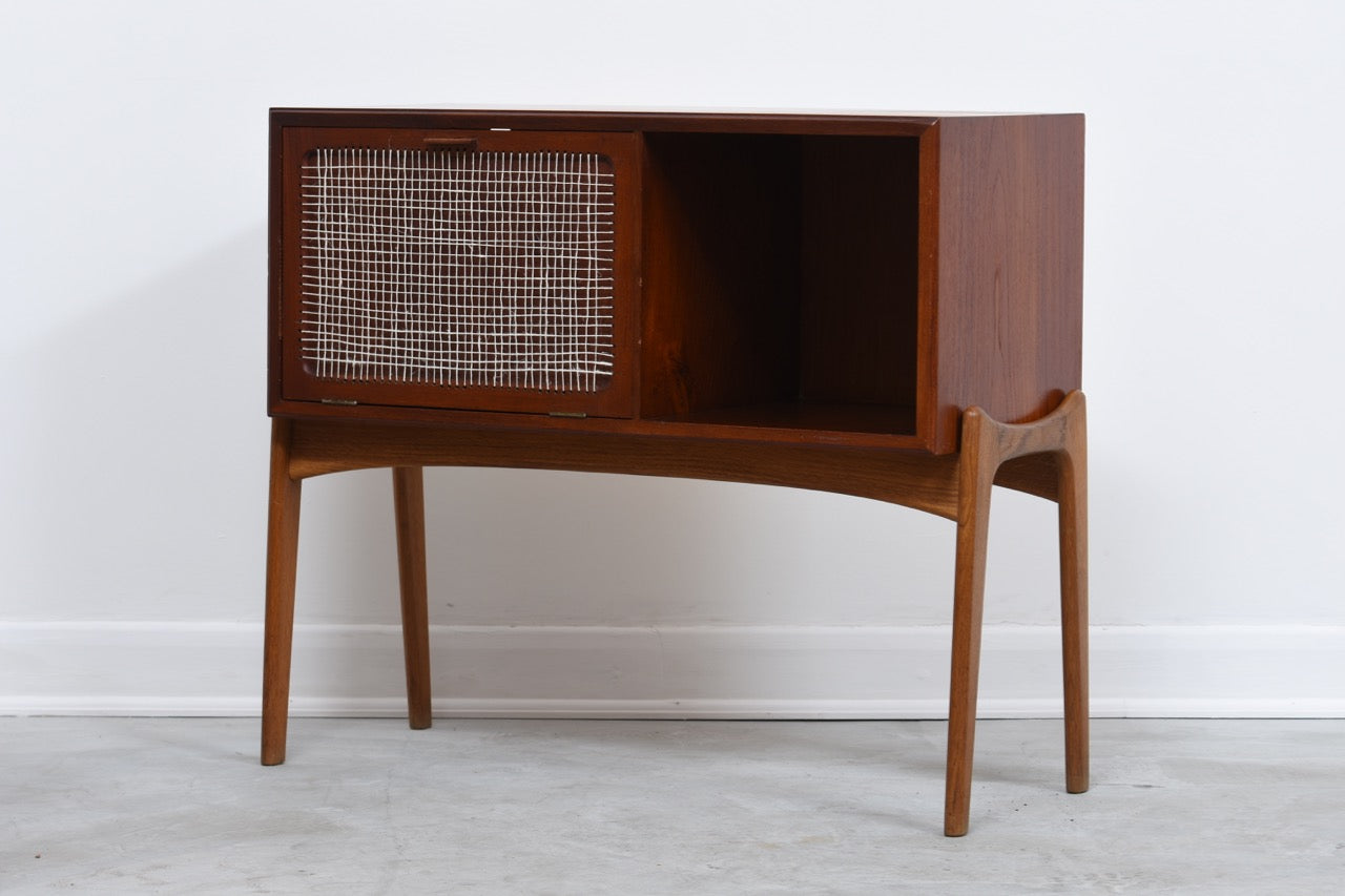 Low teak cabinet on oak base