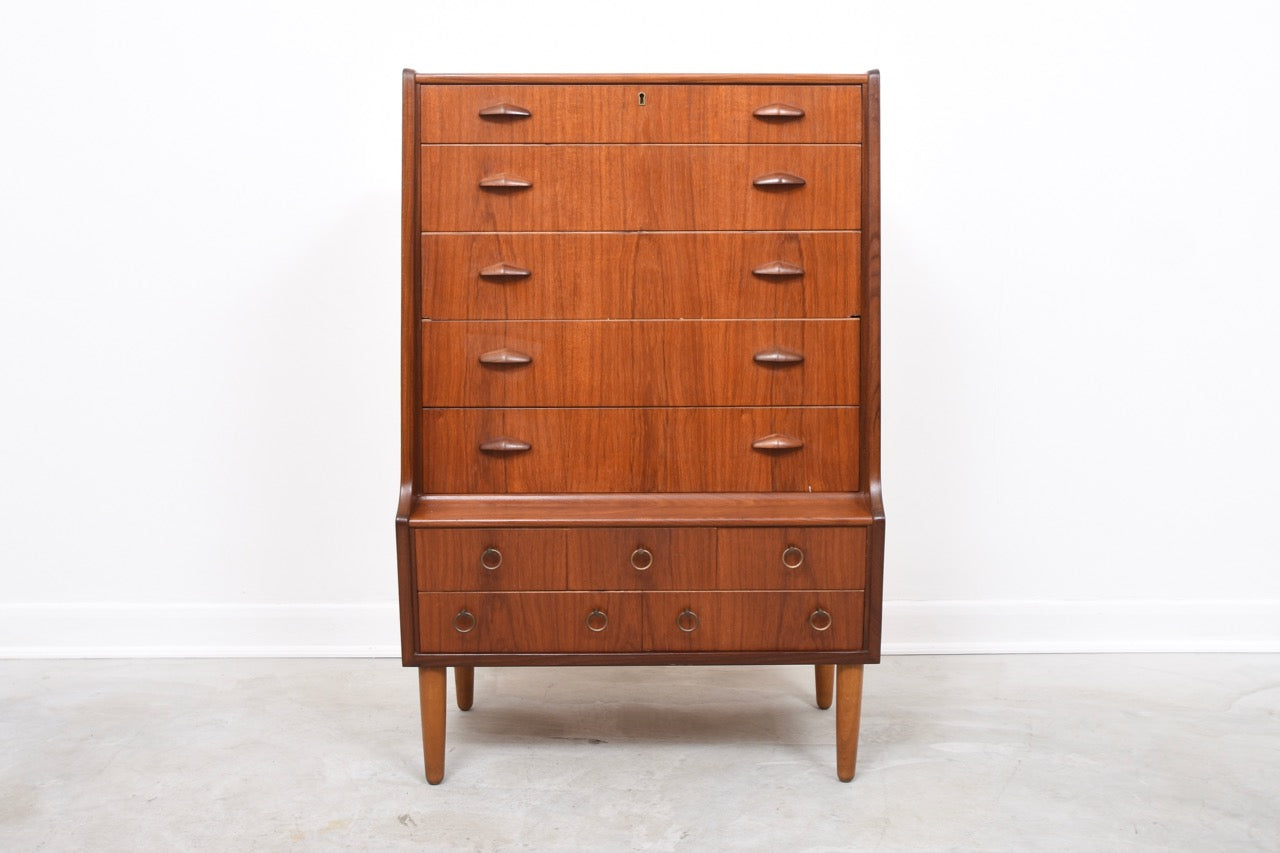 Teak chest of drawers with hidden mirror