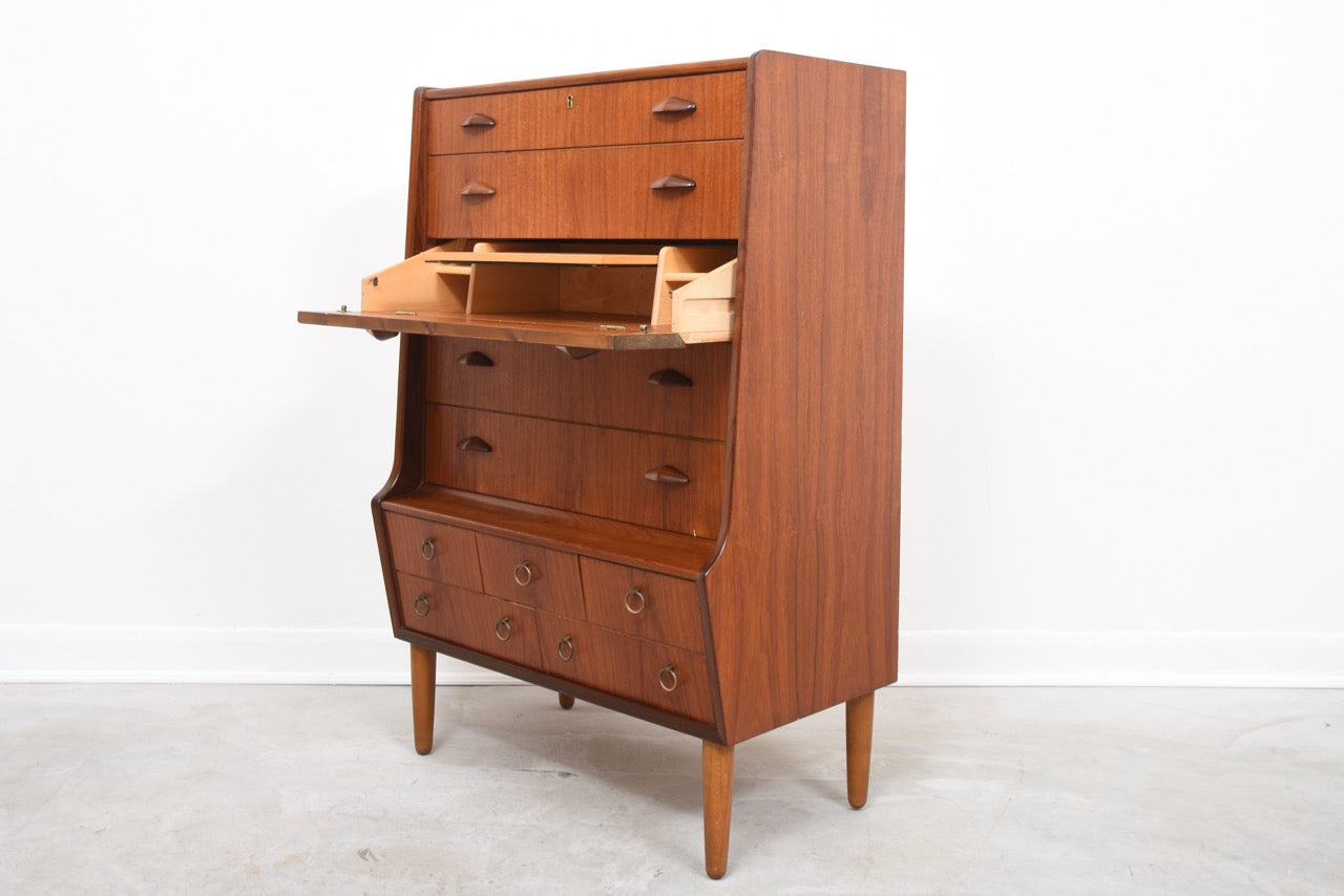 Teak chest of drawers with hidden mirror