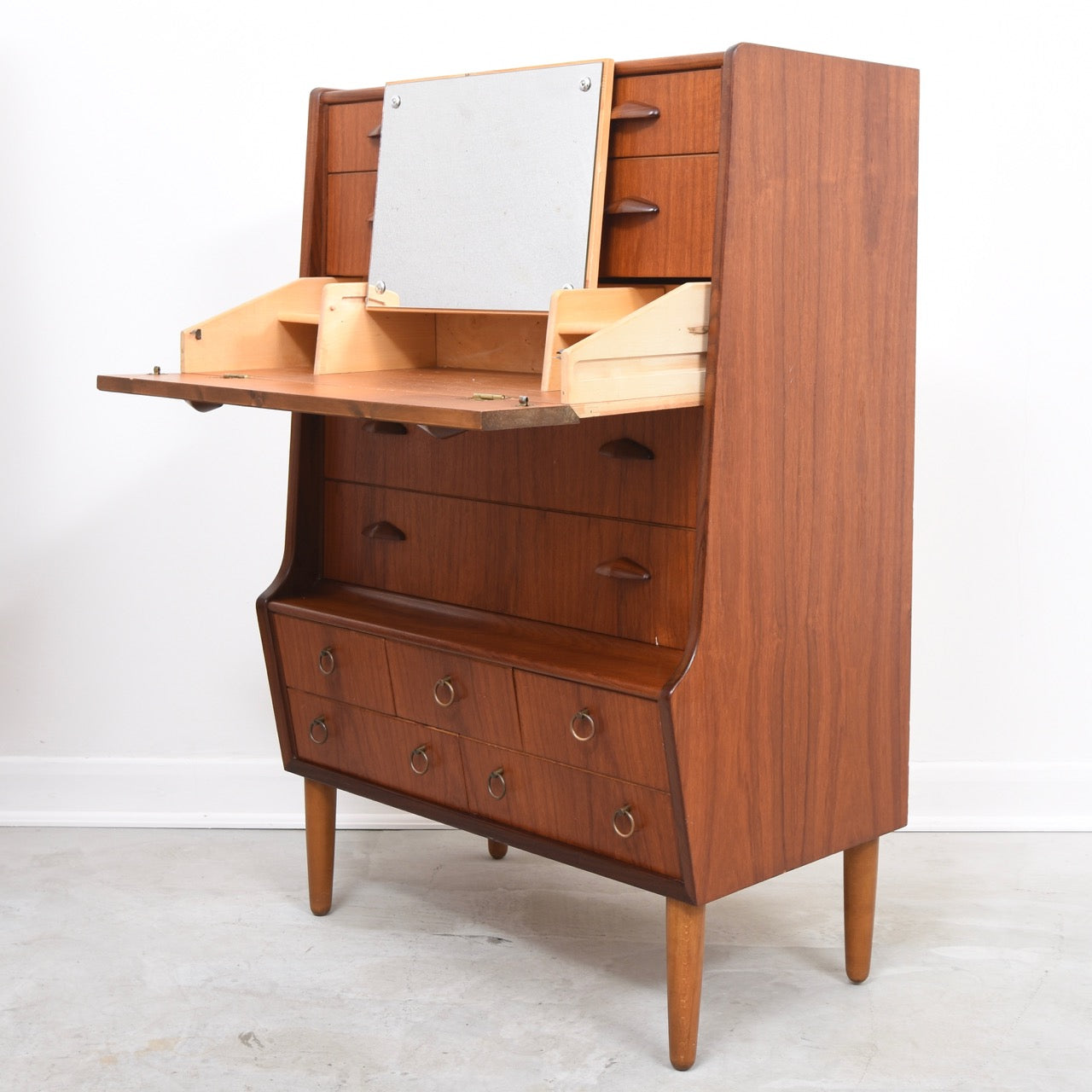 Teak chest of drawers with hidden mirror