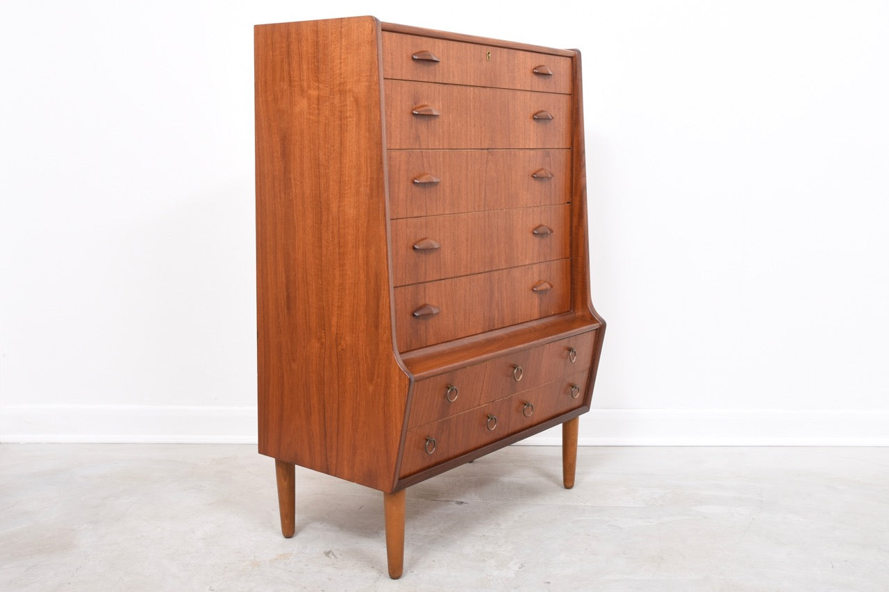 Teak chest of drawers with hidden mirror