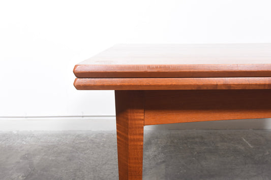 Extending rectangular dining table in teak