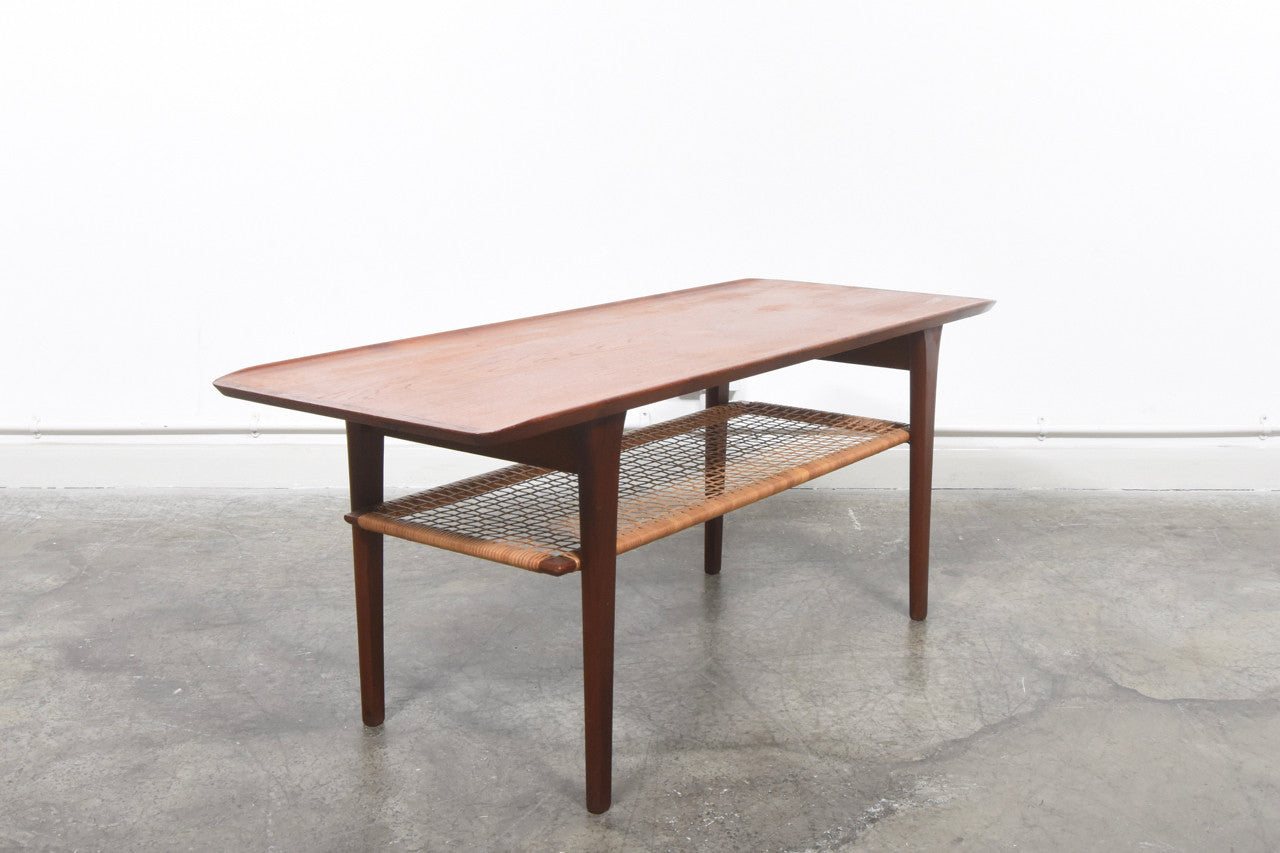 Teak coffee table with cane shelf