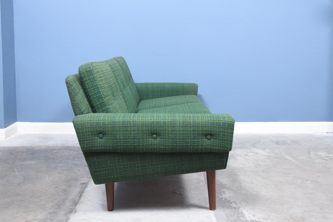 Three seat sofa in green wool