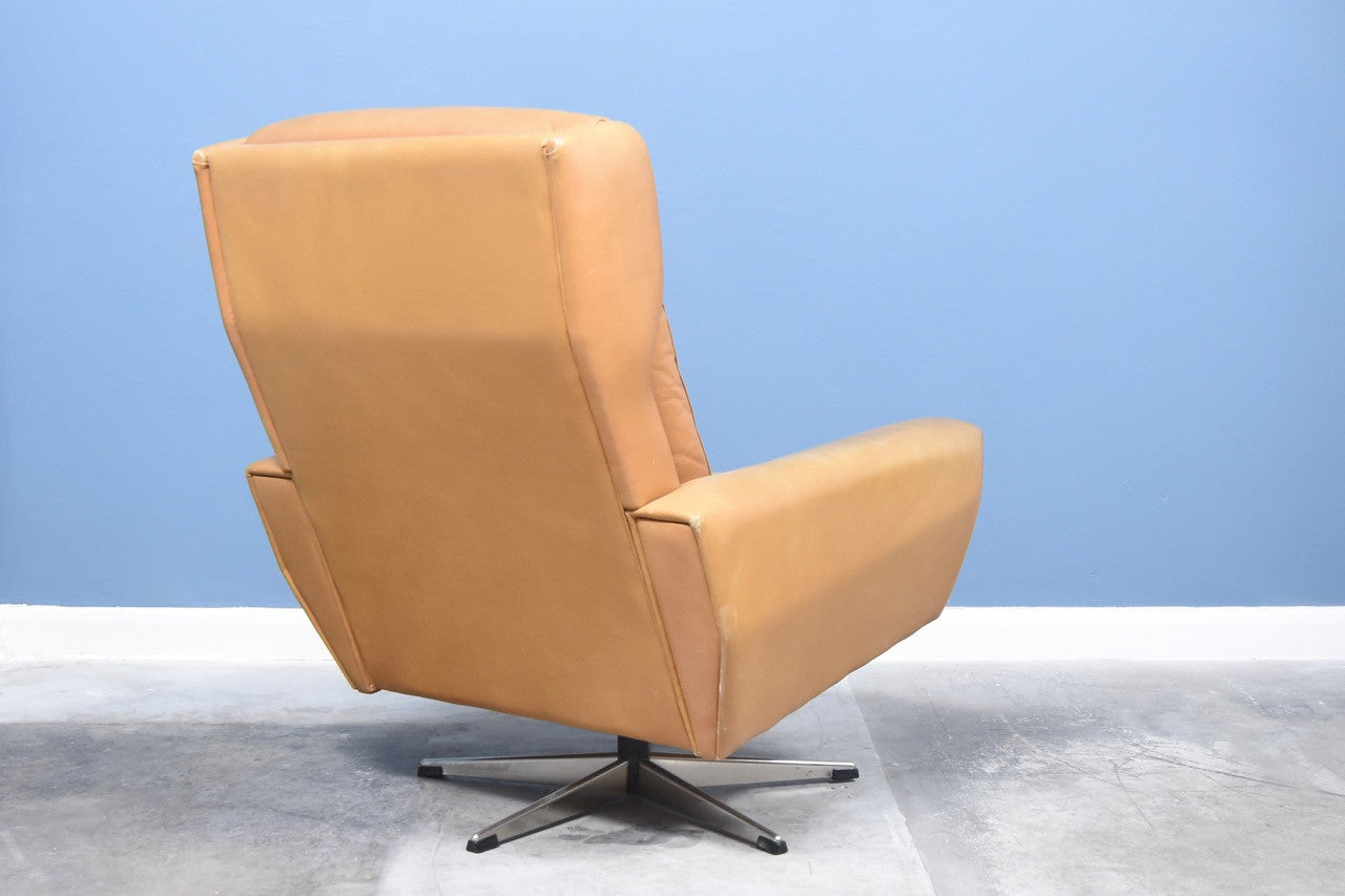 Tan leather lounge chair