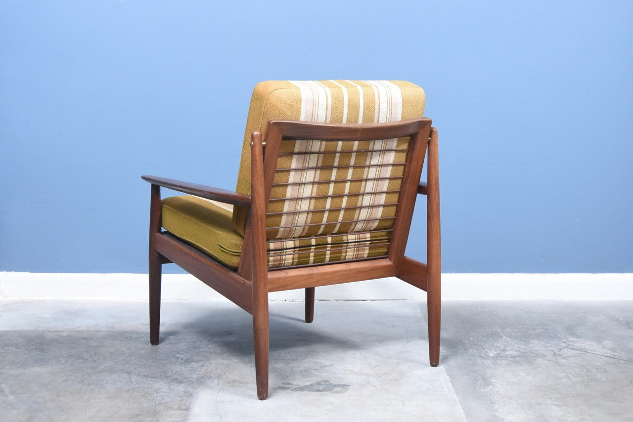Teak lounge chair with striped wool cushions
