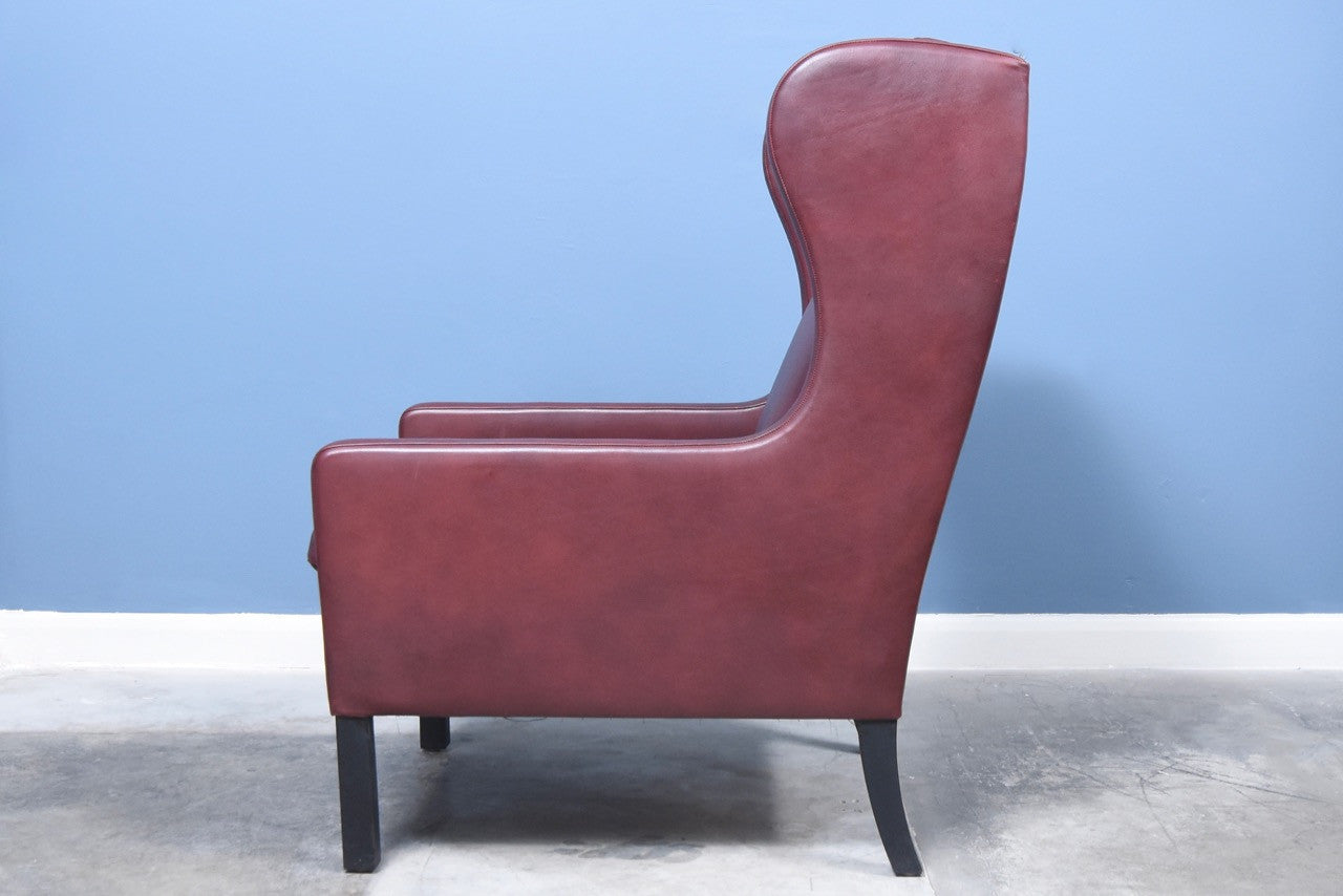 High back dark maroon lounge chair