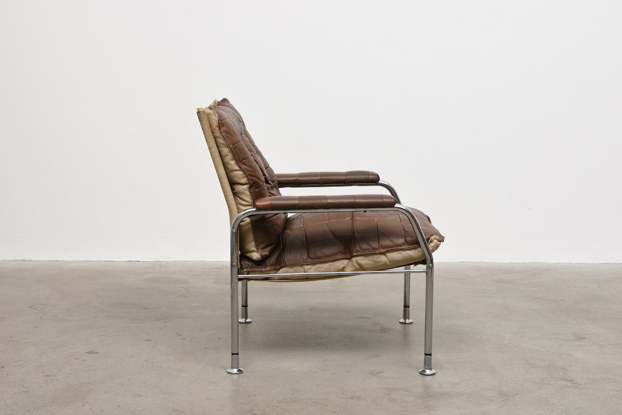 Two available: 1970s leather + metal lounge chairs
