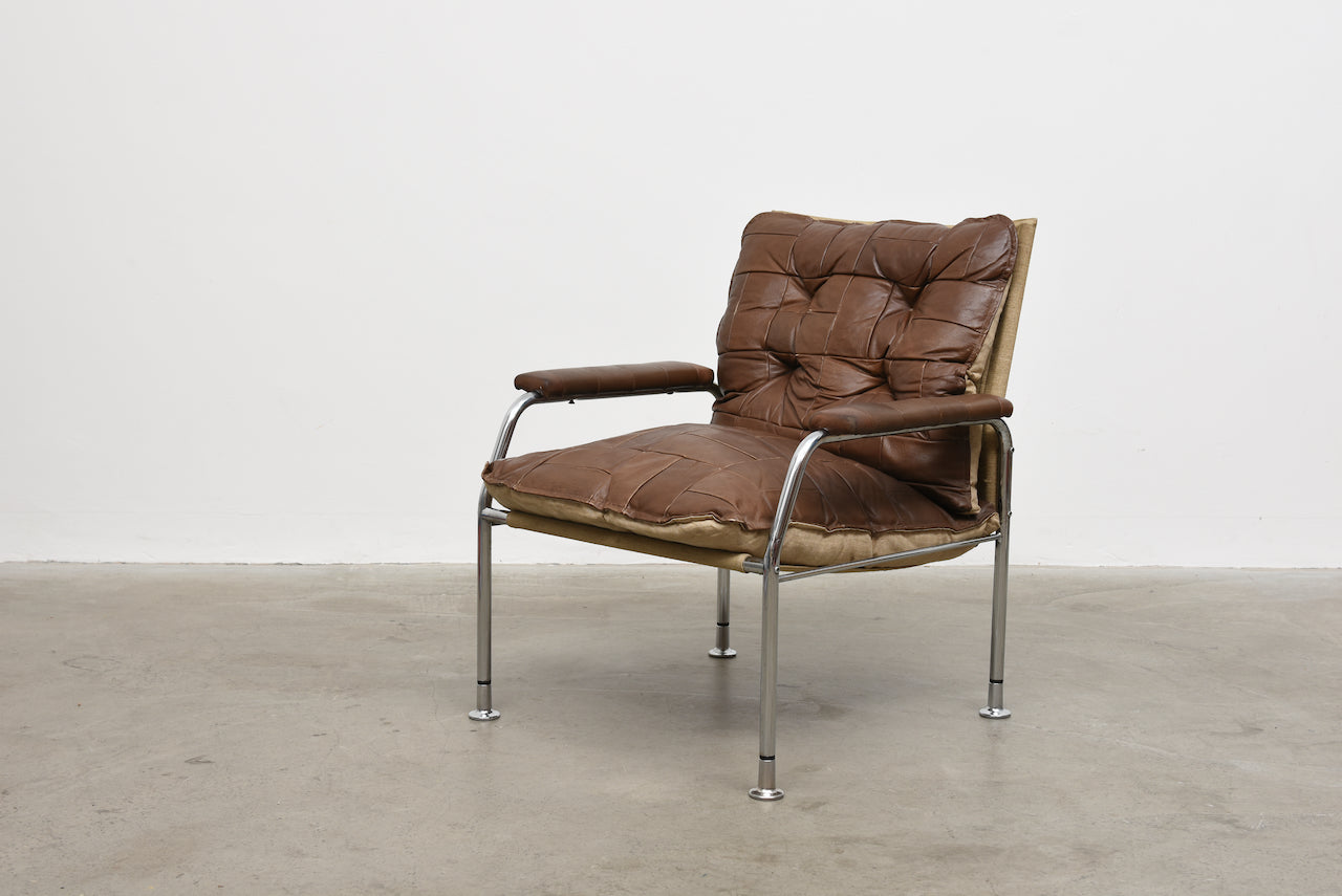 Two available: 1970s leather + metal lounge chairs