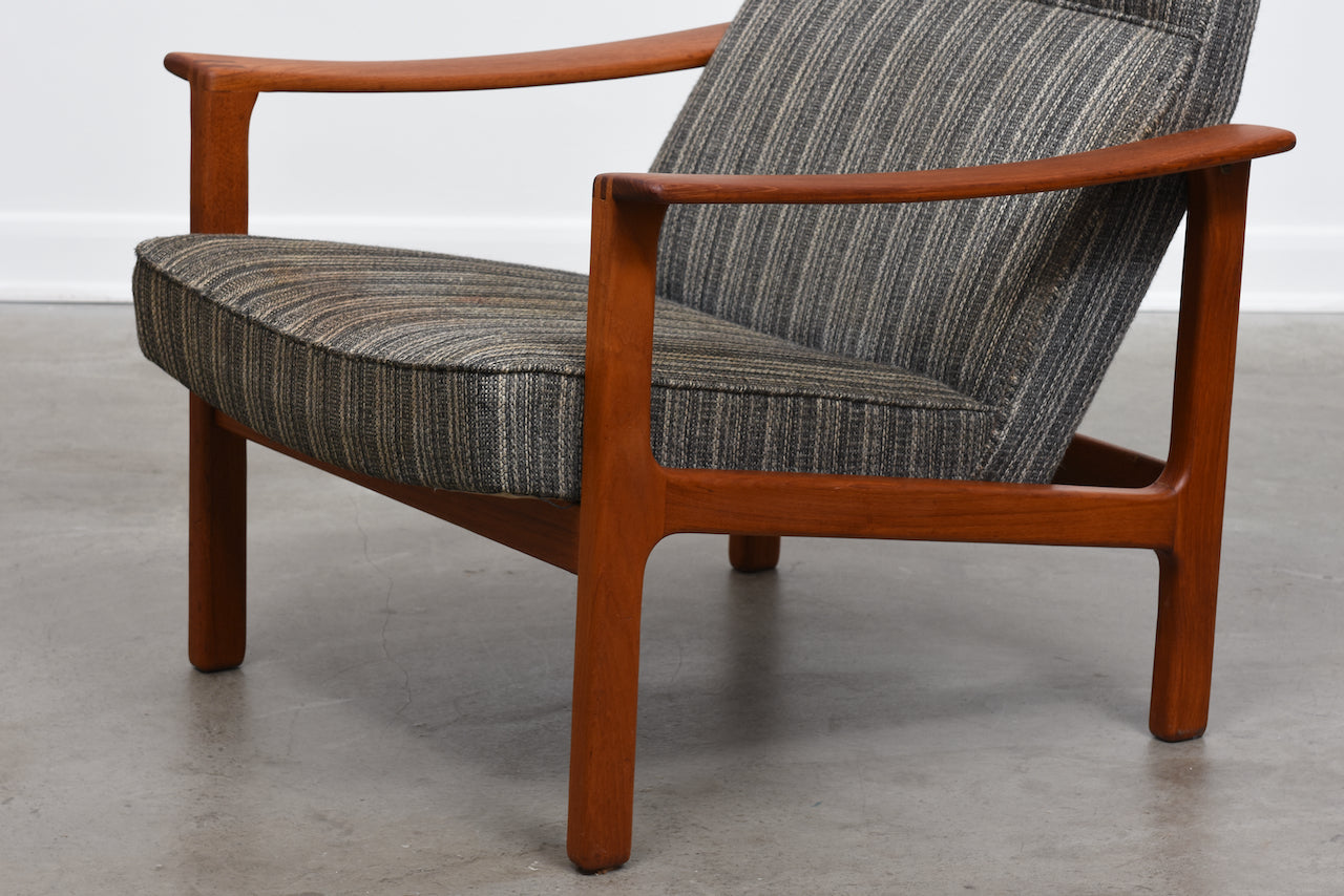 New upholstery included: 1960s high back teak lounger