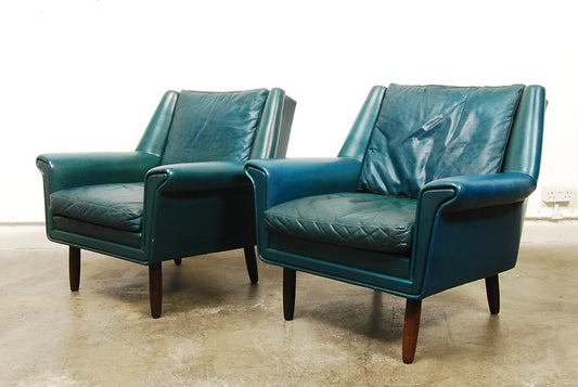 Pair of petrol blue leather loungers