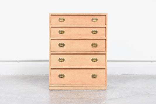 Low oak chest with brass handles