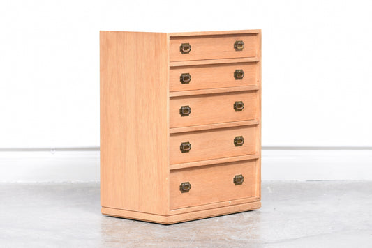 Low oak chest with brass handles