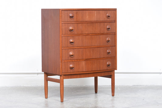 Low teak chest of five drawers by Kai Kristiansen