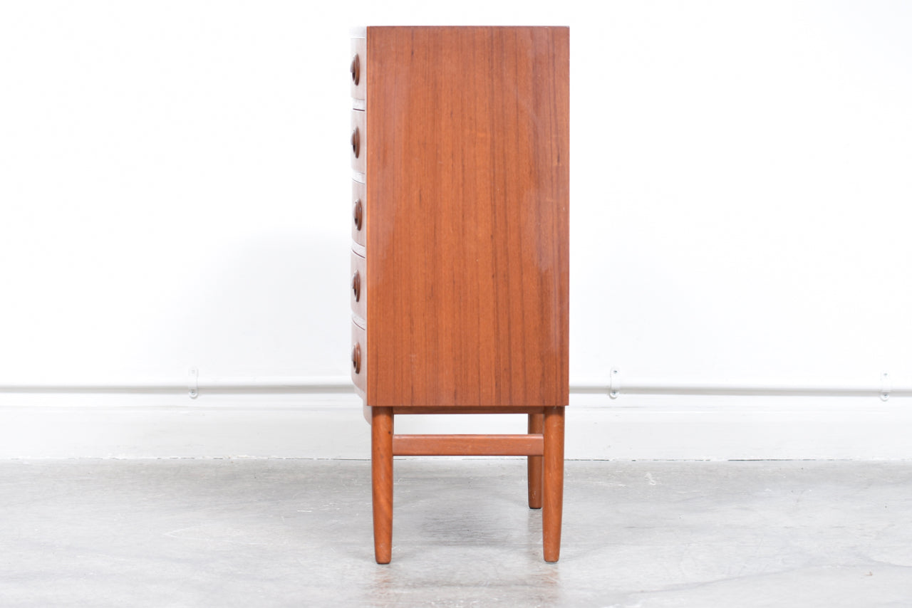 Low teak chest of five drawers by Kai Kristiansen