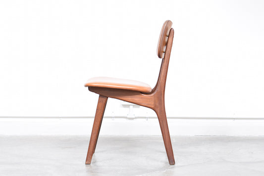 Single teak + vinyl dining chair