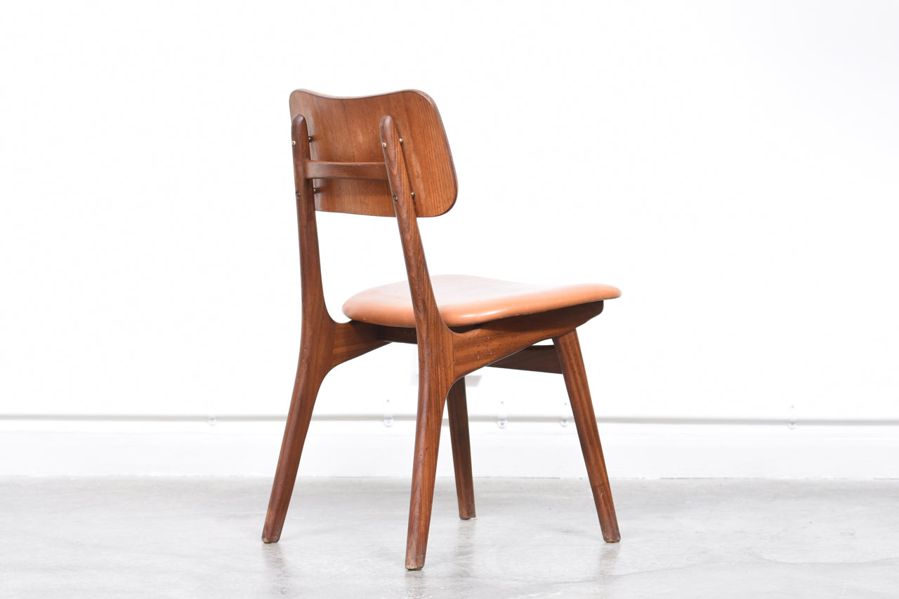 Single teak + vinyl dining chair