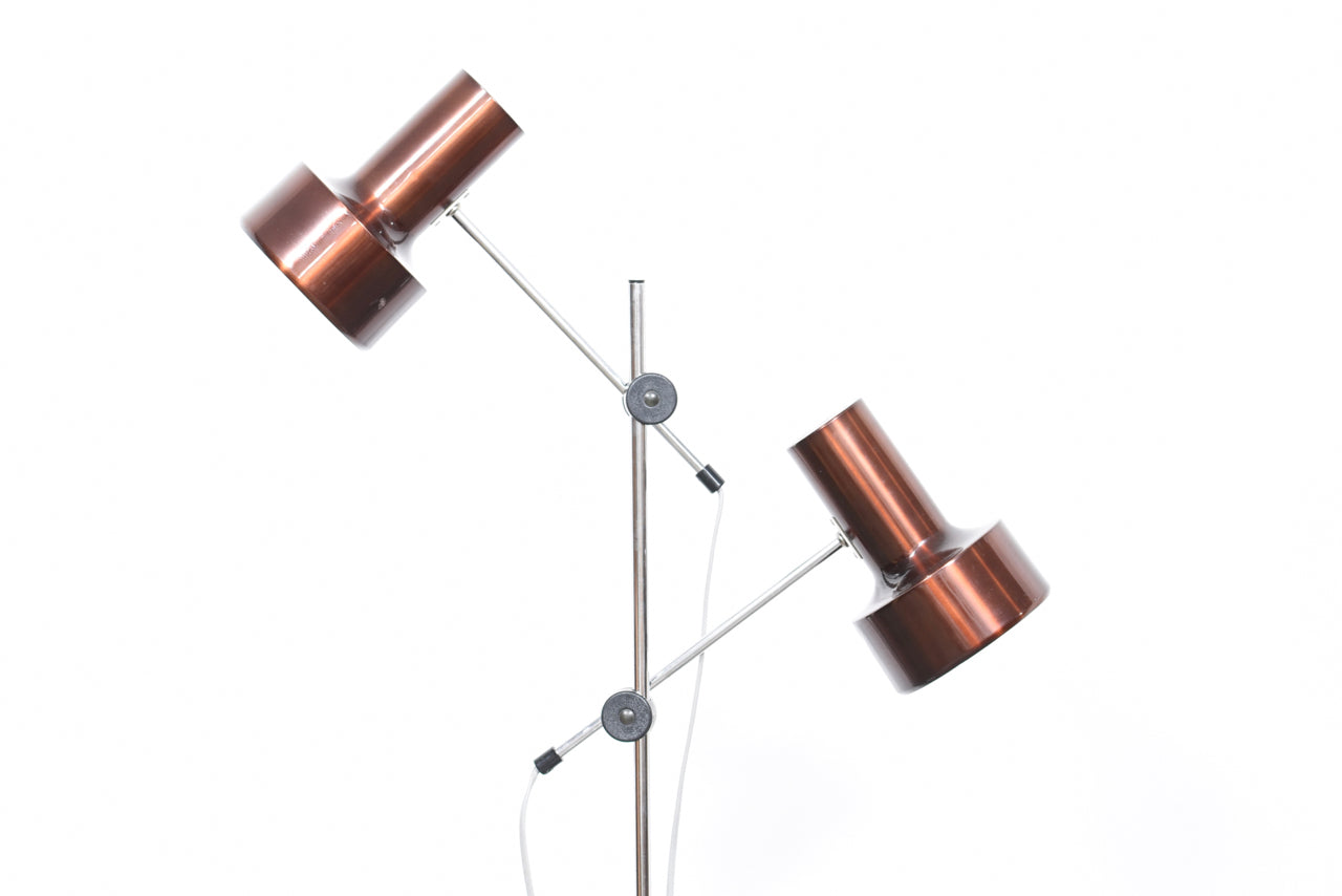 Twin-headed floor lamp with metallic bronze finish